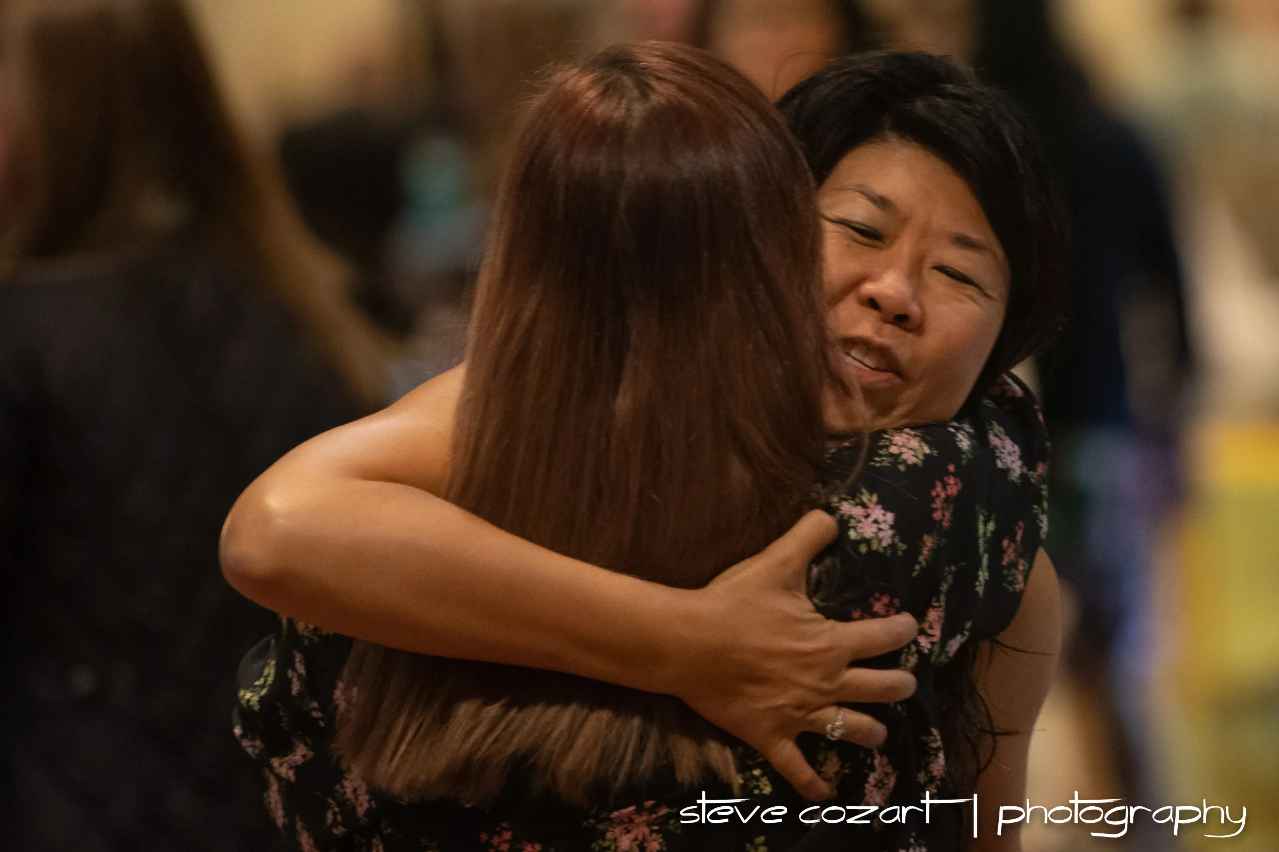 Dr. Grace hugging someone